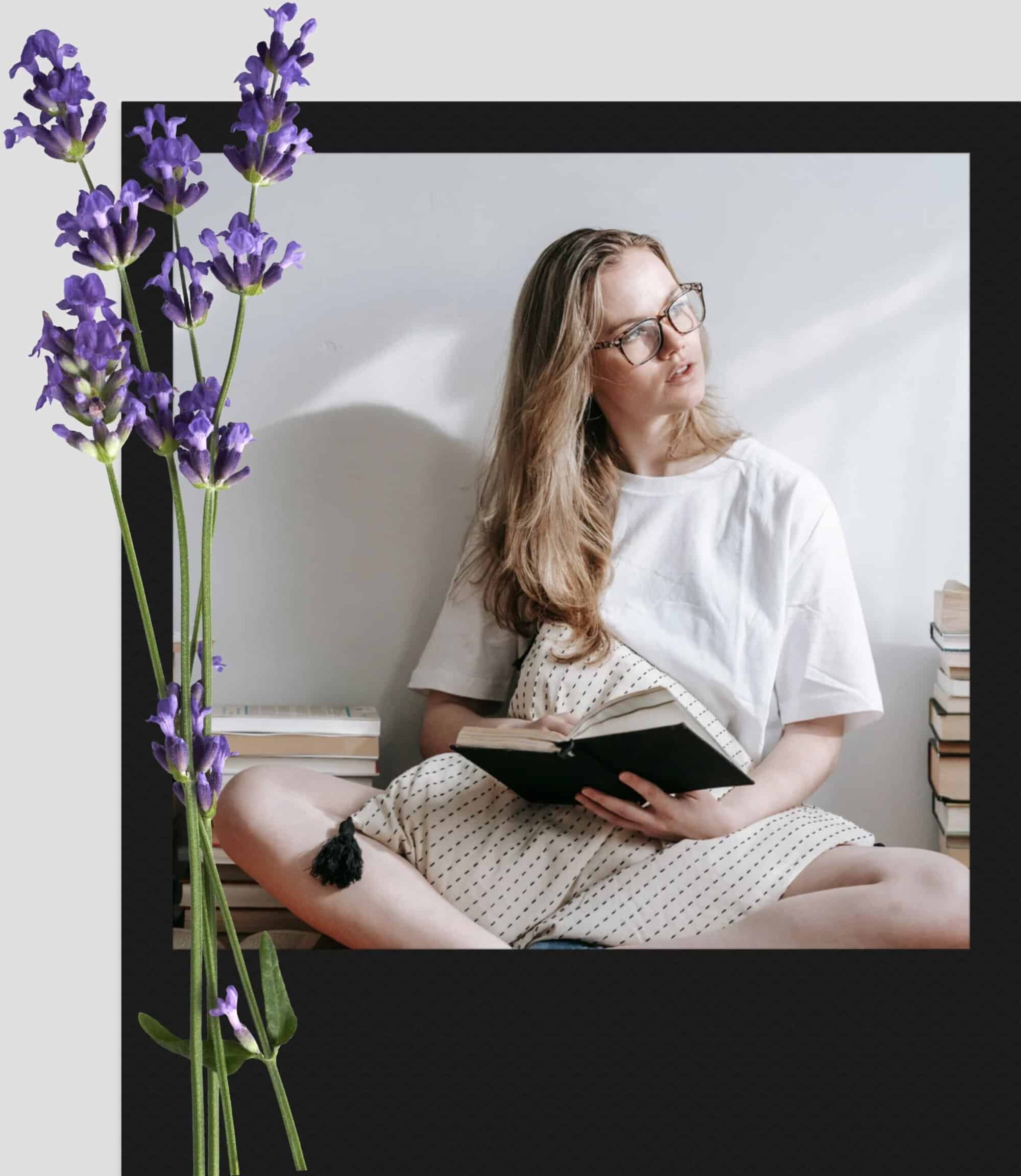 Reading woman with glasses holding book, relaxing at home.
